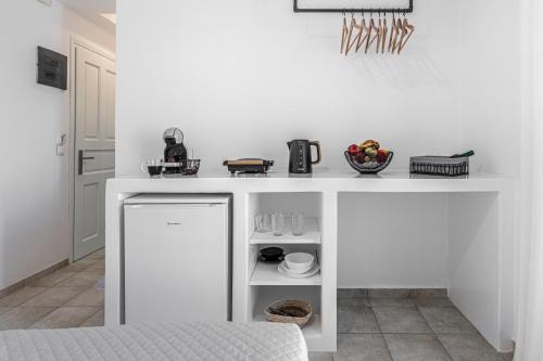 Kuchyň nebo kuchyňský kout v ubytování NAMASTEmilos