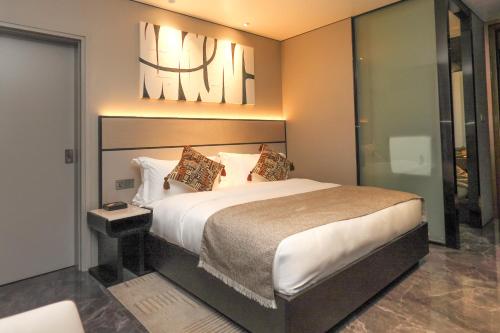 Postel nebo postele na pokoji v ubytování Pristine Mara Bay Lodge