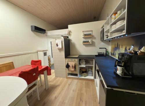 Kuchyň nebo kuchyňský kout v ubytování Vilt Hjerte Stugas