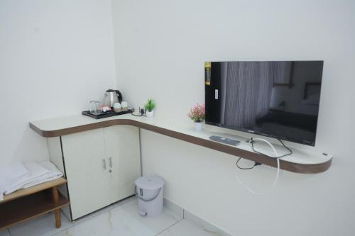 Et tv og/eller underholdning på Shiv Homestay