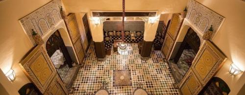 an overhead view of a room with a tile floor at Riad Panoramik in Fez