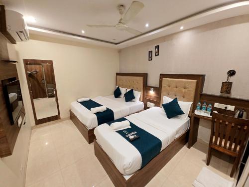 Postel nebo postele na pokoji v ubytování Hotel Amber Edition - Amber Palace