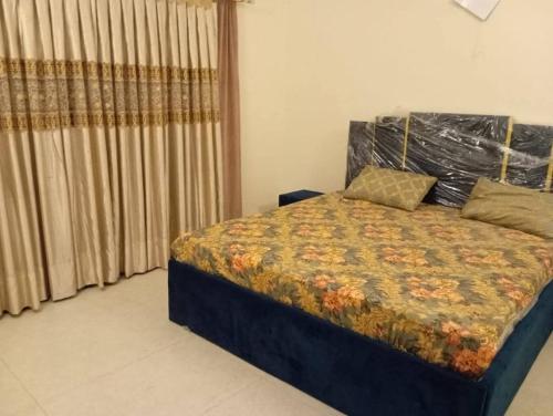 Postel nebo postele na pokoji v ubytování Haider GuestHouse