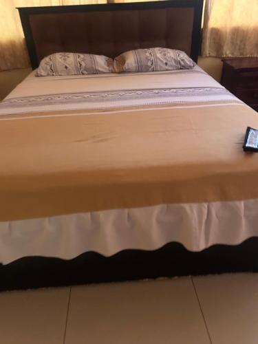 a close up of a bed in a room at Hotel Cotopaxi in El Coca