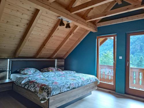 En eller flere senge i et værelse på Maison nature et calme - 3 chambres - Vue montagne