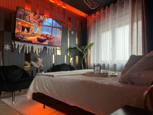 Postel nebo postele na pokoji v ubytování L'élégance - Charme - Jacuzzi - -Secret- Parking