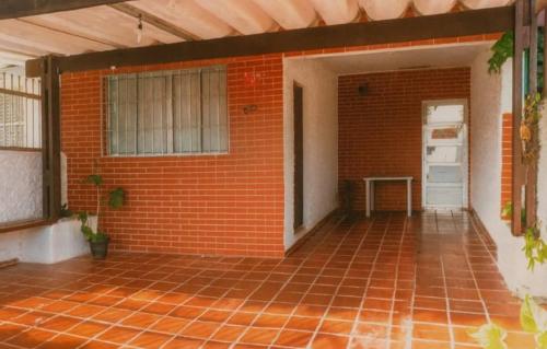 Photo de la galerie de l'établissement Casa Pé na Areia Centro de Mongaguá, à Mongaguá