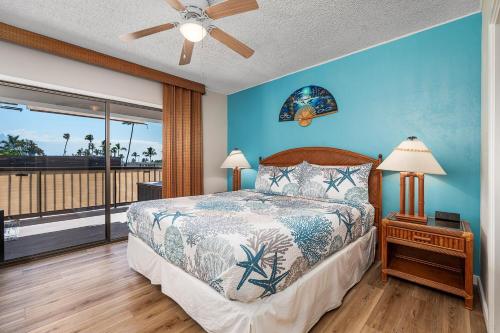 En eller flere senge i et værelse på Kona Plaza#409