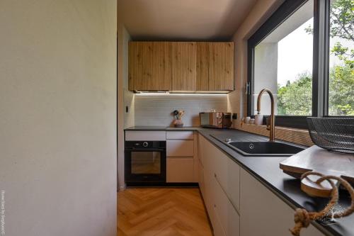 Køkken eller tekøkken på Du charme au bord de l'eau