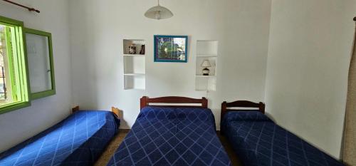 En eller flere senge i et værelse på San Clemente Centro I