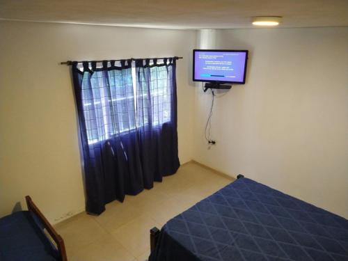 En eller flere senge i et værelse på El diquecito duplex