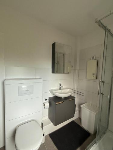 Ванная комната в Gemütliche 2-Zimmer im Erdgeschoss mit guter Anbindung