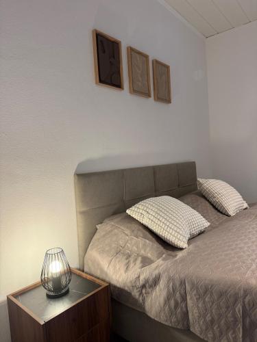 Кровать или кровати в номере Gemütliche 2-Zimmer im Erdgeschoss mit guter Anbindung