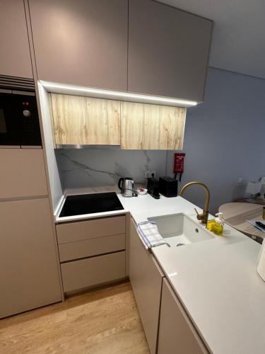Kuchyň nebo kuchyňský kout v ubytování New Douro Tower 203