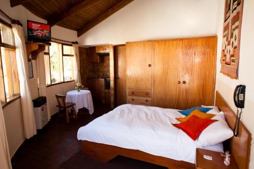 Postel nebo postele na pokoji v ubytování Hotel Oberland