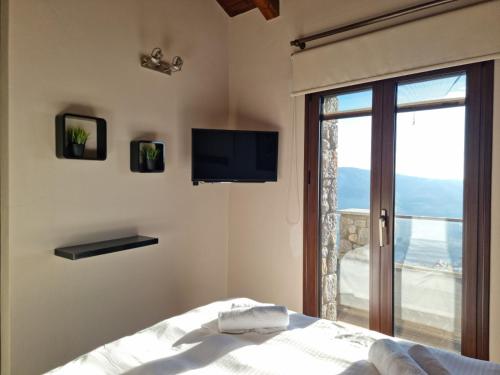 Et tv og/eller underholdning på Arachova The View Maisonette by Ski ALure