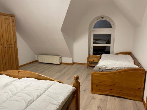 Voodi või voodid majutusasutuse Kleines Ferienhaus in Lauenburg toas