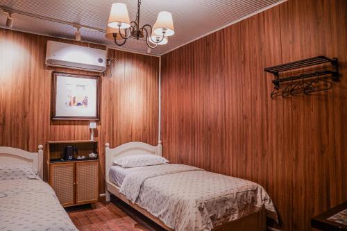 Postel nebo postele na pokoji v ubytování Chengdu Mix Hostel