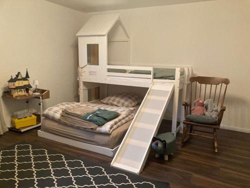 Postel nebo postele na pokoji v ubytování Ferienwohnung am Kinzigberg 5