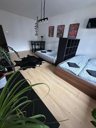 Postel nebo postele na pokoji v ubytování City Center Apartman Győr