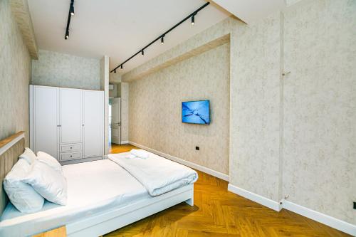 Giường trong phòng chung tại Courtyard Marriot VIP Apartment