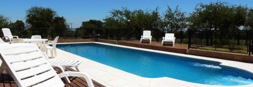 Swimmingpoolen hos eller tæt på Complejo los Espinillos de Merlo