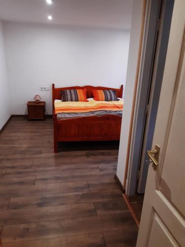 Postel nebo postele na pokoji v ubytování Tulipános Vendégház