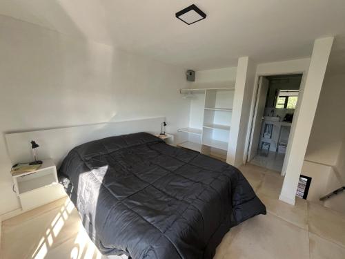 En eller flere senge i et værelse på Sierra y Lago