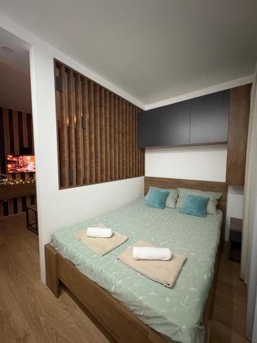 Ένα ή περισσότερα κρεβάτια σε δωμάτιο στο Apartman Brankovic