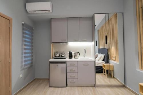 Eldhús eða eldhúskrókur á Preveza Suitestay Apartments Dodonis 28