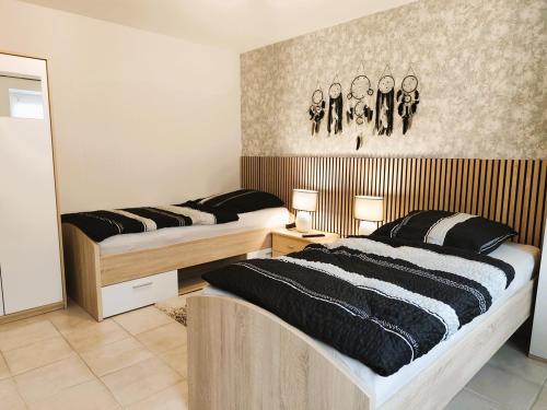 Postel nebo postele na pokoji v ubytování Ferienwohnung Kleine Oase