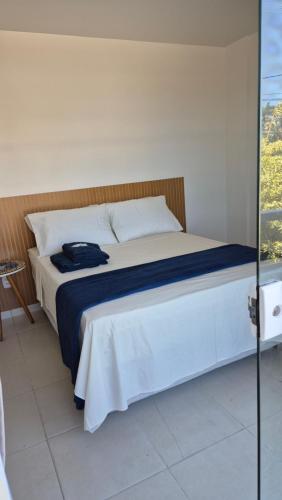 Postel nebo postele na pokoji v ubytování Apê a 100m do mar com piscina no condomínio