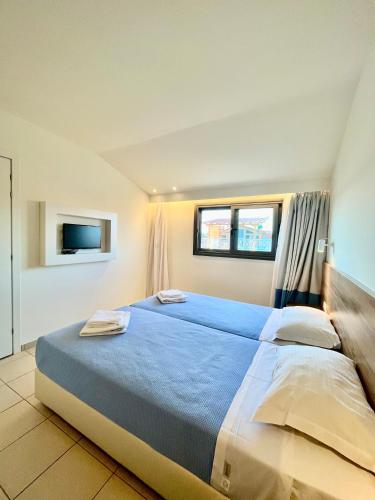 เตียงในห้องที่ Hotel Mavridis