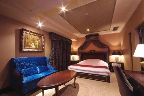 Postel nebo postele na pokoji v ubytování Hotel Pharaoh-Adult Only