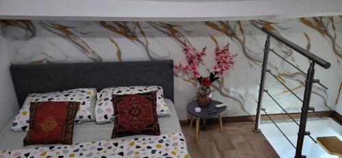 Ένα ή περισσότερα κρεβάτια σε δωμάτιο στο Lille Flandre