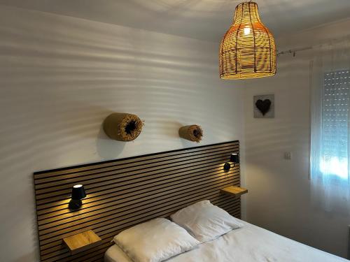 En eller flere senge i et værelse på Gites de la Casasole