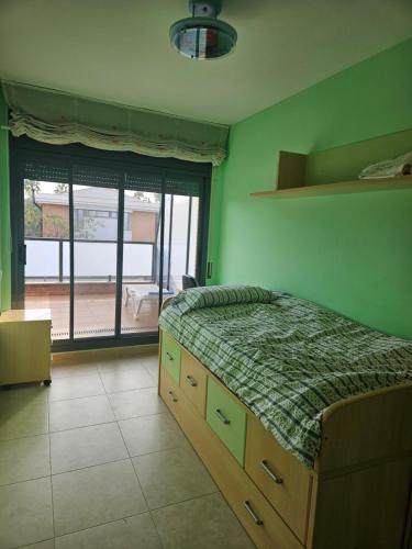 En eller flere senge i et værelse på Casa Carnau