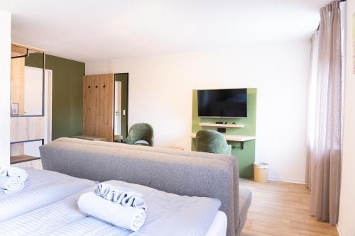 Postel nebo postele na pokoji v ubytování Land-gut-Hotel Waldesruh