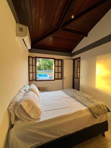 Ένα ή περισσότερα κρεβάτια σε δωμάτιο στο Sitio Riacho Doce