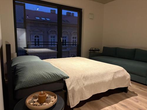 Krevet ili kreveti u jedinici u okviru objekta Subway Apartment