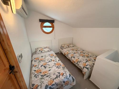 En eller flere senge i et værelse på Contemporary House in Cabo Roig