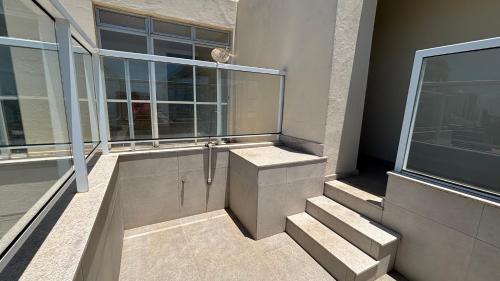 Billede fra billedgalleriet på Areia Flat vista mar piscina e ar i Guarapari