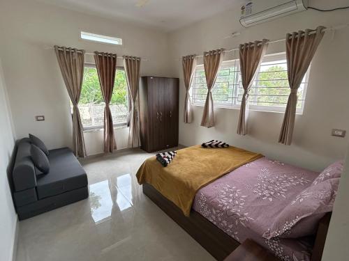 Postel nebo postele na pokoji v ubytování Glenville Holiday Villa - Nandi Hills