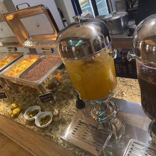 a drink in a blender sitting on a counter at Hotel Grand Lion in Torreón