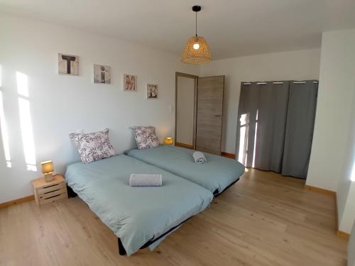 Postel nebo postele na pokoji v ubytování Au bien-hêtre