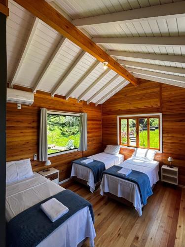 En eller flere senge i et værelse på Quinta Terra Sagrada