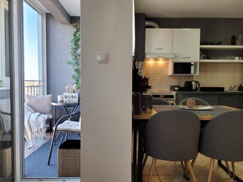 Kuchyň nebo kuchyňský kout v ubytování Apartman Riva Parking Garaža