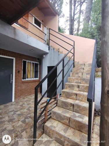 a set of stairs leading to a house at Large Duplex #1 in San Bernardo