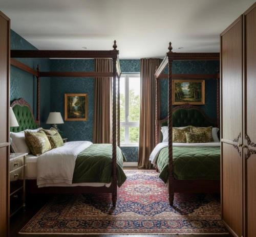 a bedroom with two beds and a window at رويال علاء للشقق الفندقيه in Dubai
