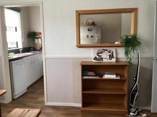 a kitchen with a mirror and a sink at Funski Lodge sleeps 10 Where Adventure Begins in Taumarunui